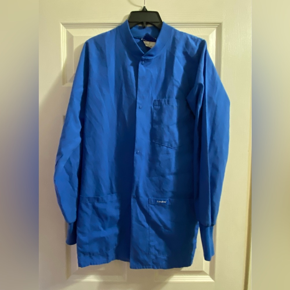 Landau long sleeve lab coat is a size Small.